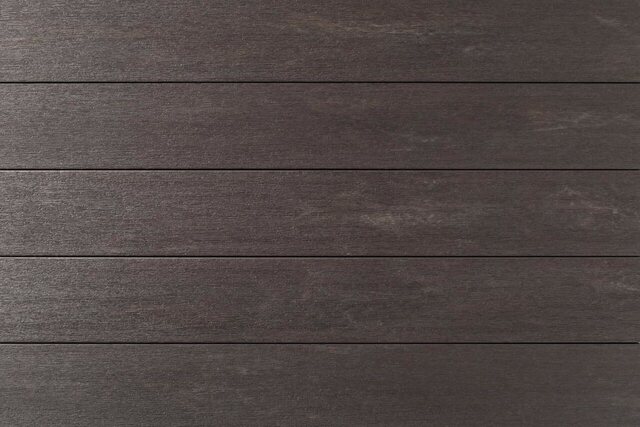 Close-up of TimberTech Porch Collection boards in Dark Hickory, a deep brown with pronounced grain.
