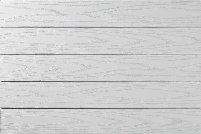 Close-up of TimberTech Porch Collection boards in Oyster, a light warm gray.