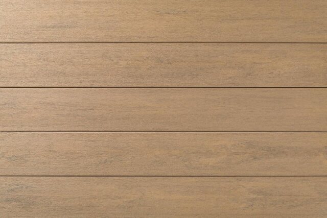Close-up of TimberTech Porch Collection boards in Weathered Teak, a warm honey brown.